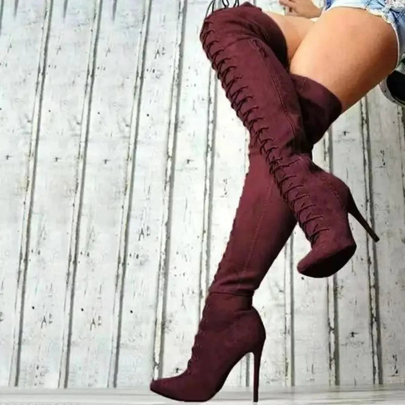 Botas con punta estrecha por encima de la rodilla