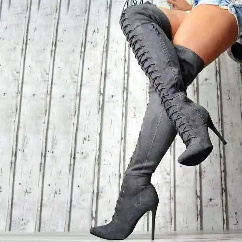 Botas con punta estrecha por encima de la rodilla